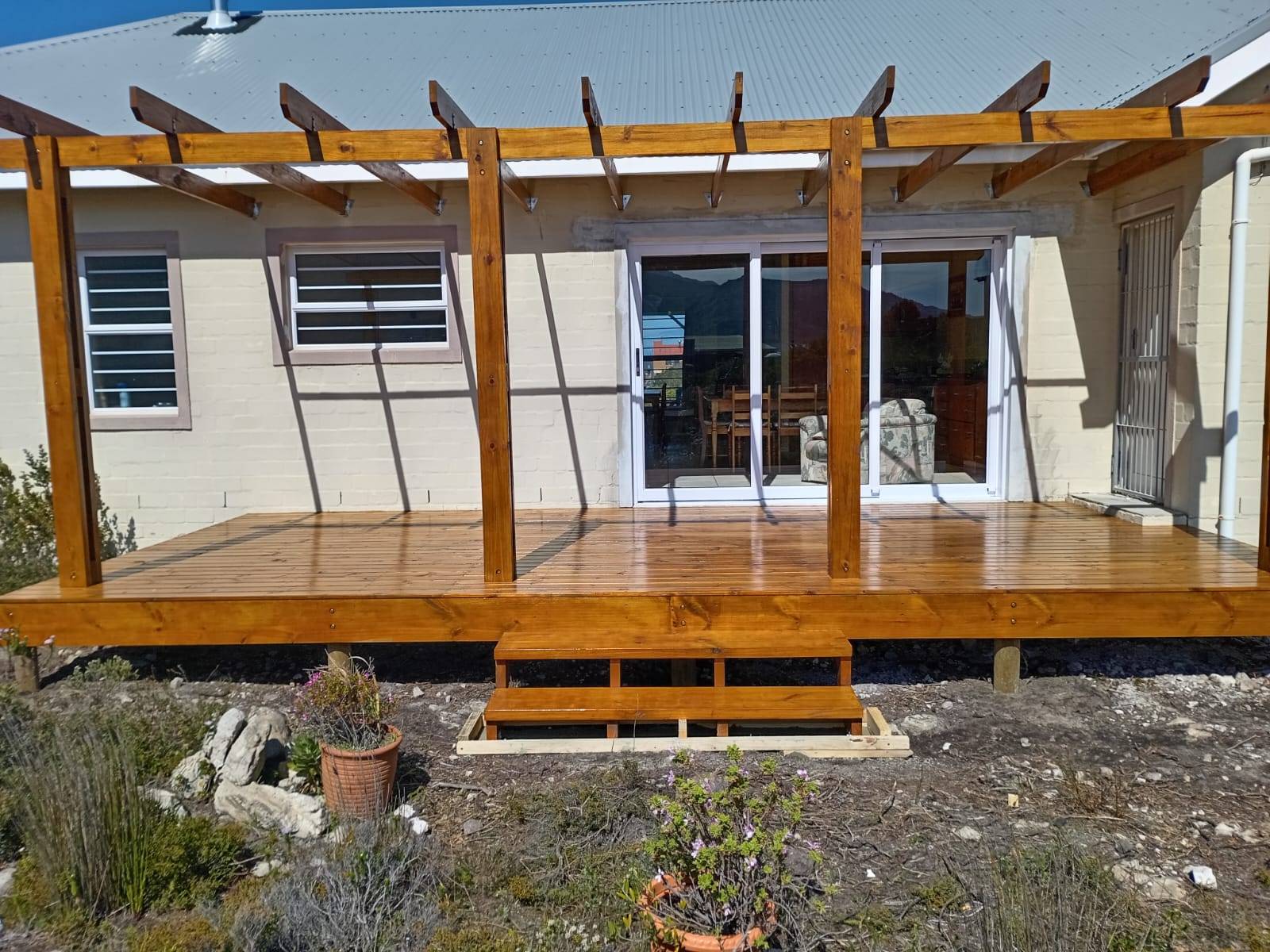 Pergola with a mountain reflection
